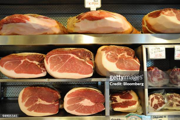 Cured hams on display at the Volpetti delicatessen in the Testaccio area of Rome, Italy, on Thursday, April 10, 2008. European inflation accelerated...