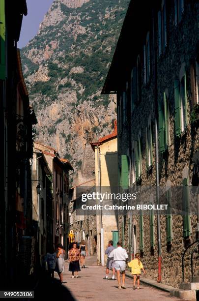 Narrow street in the village of Villefranche-de-Conflent. The houses, essentially made of pink marble, have not changed since the end of the XVIIth...