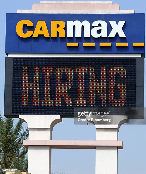 Car dealership advertises for new salespeople on Friday, August 5, 2005 in Monrovia, California. U.S. Employers added 207,000 workers in July, a...