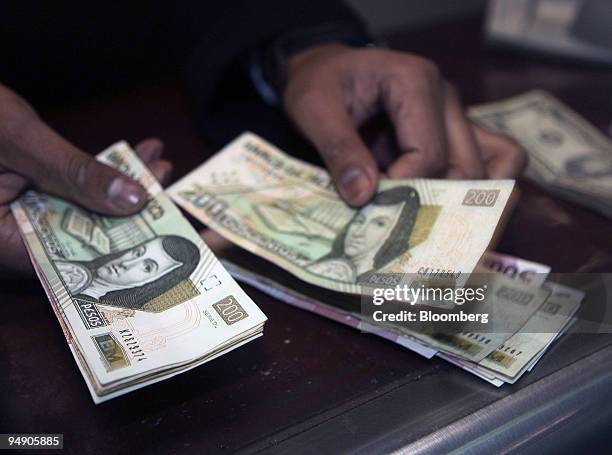Us Dollars To Mexican Pesos Photos And Premium High Res Pictures us-dollars-to-mexican-pesos-photos-and-premium-high-res-pictures
