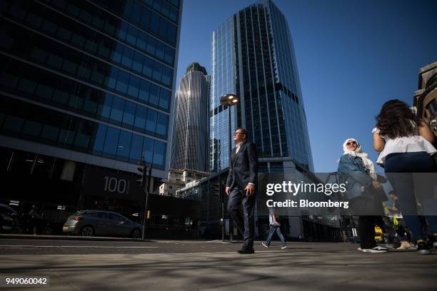 Skyscrapers Tower 42, centre, and 100 bishopsgate, left, stand in the City of London, U.K., on Friday, April 20, 2018. Foreign investors are less...