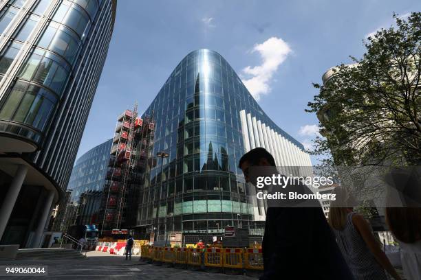 Pedestrian passes the new European headquarters of Goldman Sachs Group Inc. In London, U.K., on Friday, April 20, 2018. Foreign investors are less...