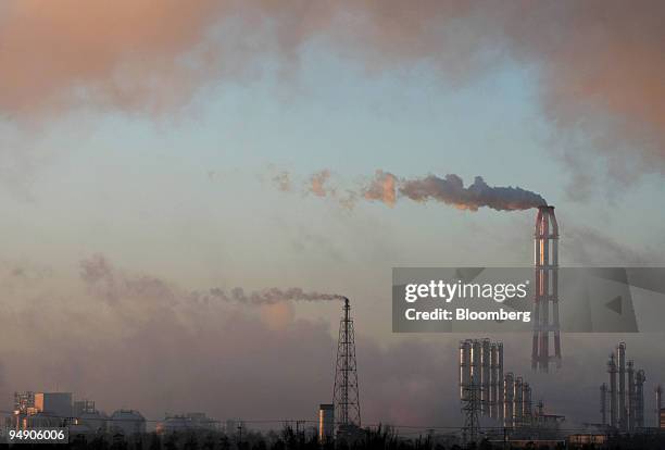 Chemical plants release trails of steam in Kamisu City, Ibaraki Prefecture, Japan, on Friday, Dec. 14, 2007. Japan Prime Minister Taro Aso said the...