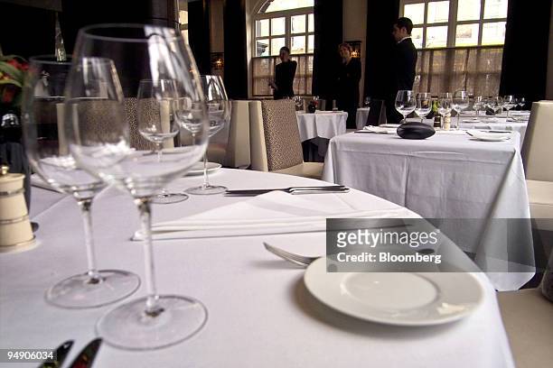 Tables have been set in preparation for the lunchtime crowd at The Ledbury restaurant in the Notting Hill section of London, on Monday, August 1,...