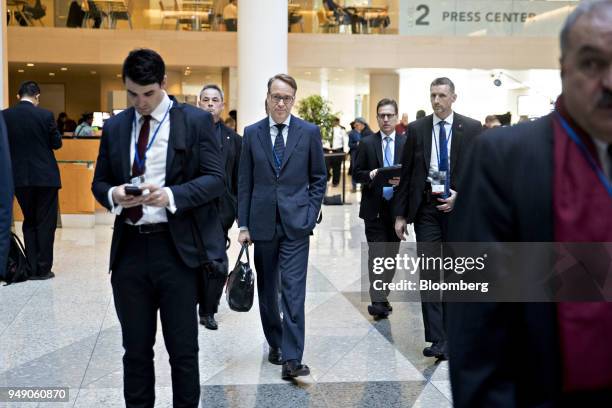 Jens Weidmann, president of the Deutsche Bundesbank, center, arrives to a Group of 20 finance ministers and central bank governors meeting on the...