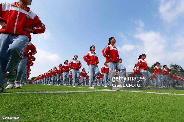 Students of the second middle school of longchang town, weining autonomous county, guizhou province, China are engaged in a major interclass...