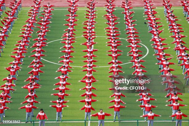 Students of the second middle school of longchang town, weining autonomous county, guizhou province, China are engaged in a major interclass...