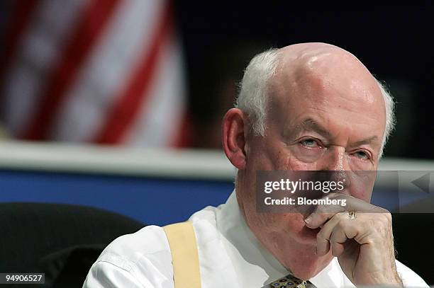 John Sweeney listens to a speech nominating him for a fourth term as president of the AFL-CIO during their annual convention in Chicago, Illinois...