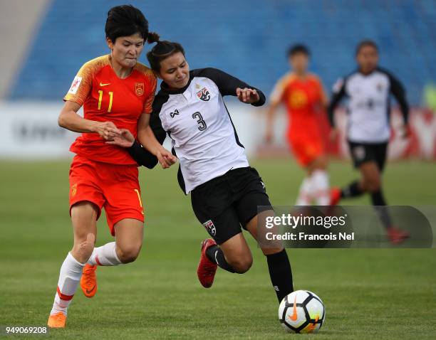 Wang Shanshan of China and Natthakarn Chinwong of Thailand in action during the AFC Women's Asian Cup third place match between China and Thailand at...