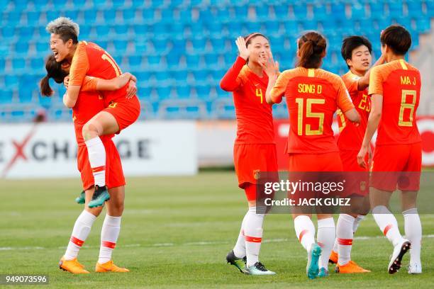 China's forward Ying Li celebrates after scoring during the AFC Women's Asian Cup match for third place between China and Thailand at the King...