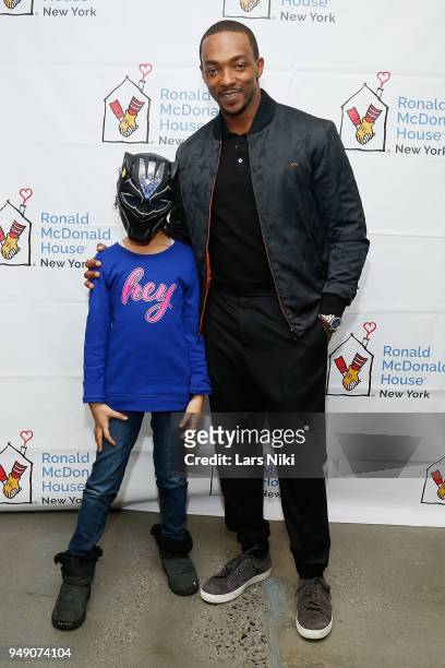 Actor Anthony Mackie, star of Avengers Infinity War, greets some young fans and hands out gifts at Ronald McDonald House New York on April 19, 2018...