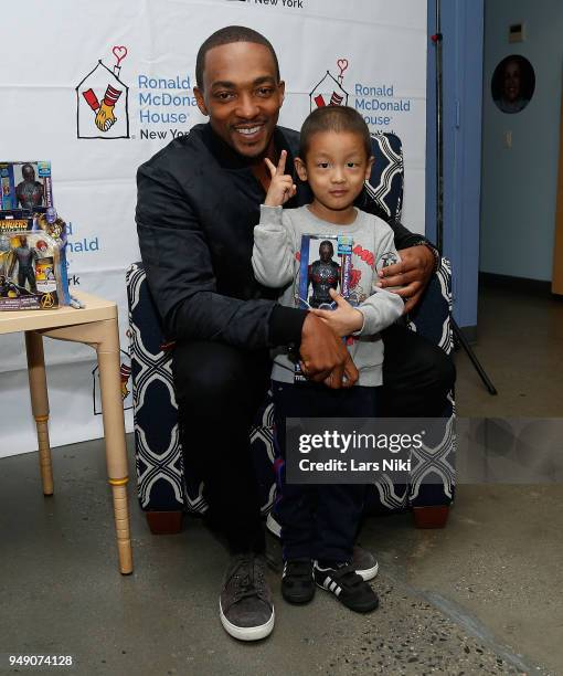 Actor Anthony Mackie, star of Avengers Infinity War, greets some young fans and hands out gifts at Ronald McDonald House New York on April 19, 2018...