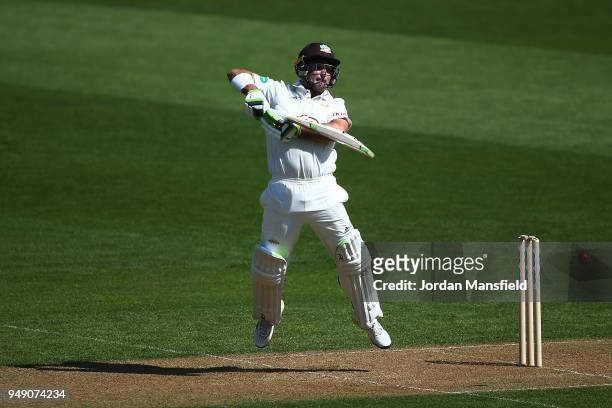 Dean Elgar of Surrey has to take evasive action during day one of the Division One Specsavers County Championship match between Surrey and Hampshire...