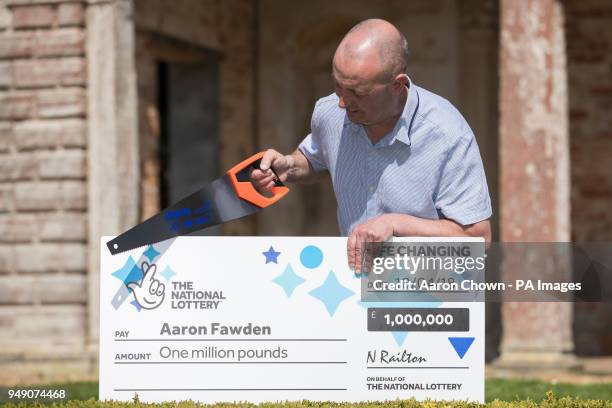 Self employed carpenter and single dad of two, Aaron Fawden celebrates after winning one millions pounds in the EuroMillions UK Millionnaire Maker...