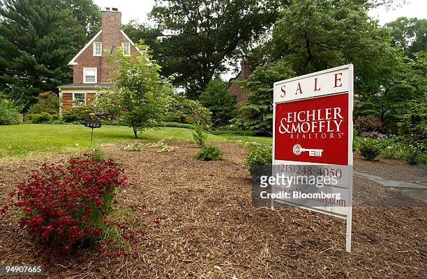 Sign on the lawn of a home is for sale is seen in Philadelphia, Pennsylvania, Friday, June 25, 2004. U.S. Sales of previously owned homes...