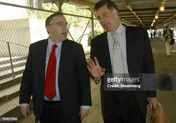 Former General Counsel for Tyco International Ltd. Mark Belnick, left, leaves court in New York with his lawyer, Reid Weingarten, Monday, June 21,...