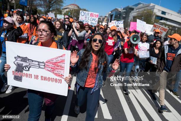 Students march to the Capitol on Pennsylvania Avenue to call on Congress to act on gun violence prevention during a national walkout on April 20...