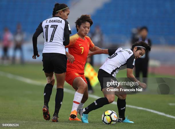 Wang Shuang of China battles for the ball with Taneekarn Dangda and Ainon Phancha of Thailand during the AFC Women's Asian Cup third place match...