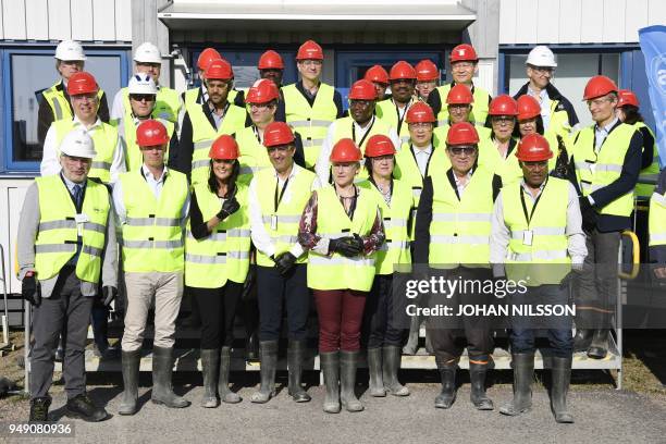 The members of the UN Security Council pose for a family photo during a visit at the European Spallation Source in Lund, Sweden on April 20, 2019. -...