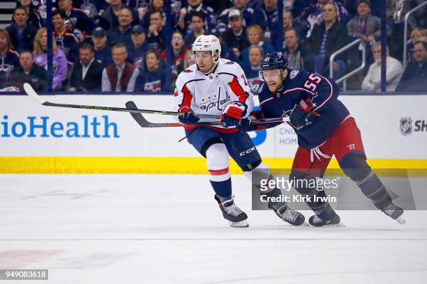 Matt Niskanen of the Washington Capitals and Mark Letestu of the Columbus Blue Jackets chase after the puck in Game Three of the Eastern Conference...