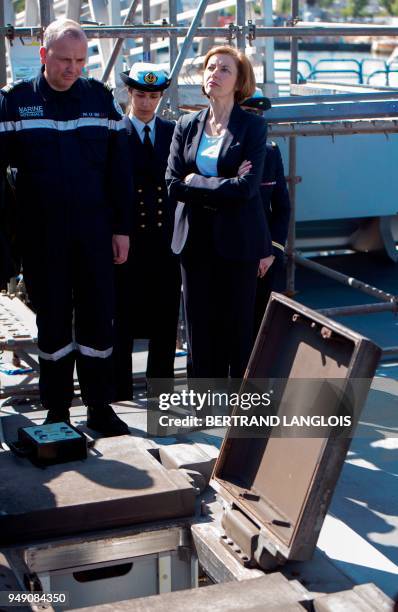 French Defence Minister Florence Parly checks the missiles launch ramp with French navy soldiers onboard the FREMM 'Languedoc' in Toulon, southern...