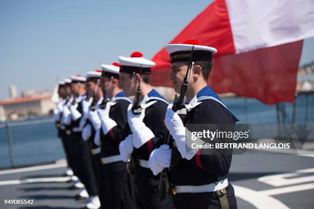 French navy soldiers stand prior to French Defence Minister's visit onboard the FREMM 'Languedoc' in Toulon, southern France, on April 20 one week...