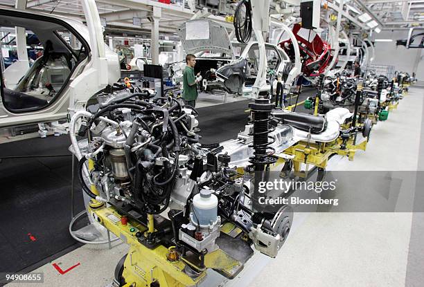 Part-assembled Skoda Fabia cars seen on the assembly line at the Skoda plant in Mlada Boleslav, Czech Republic, Friday, June 18, 2004.