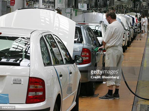 Skoda Fabia cars is fuelled on the production line at the Skoda plant in Mlada Boleslav, Czech Republic, Friday, June 18, 2004.