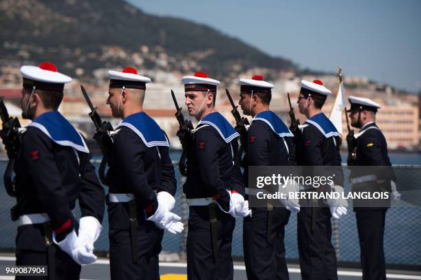 French navy soldiers stand prior to French Defence Minister's visit onboard the FREMM 'Languedoc' in Toulon, southern France, on April 20 one week...