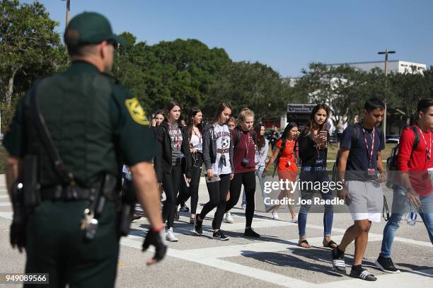 Students from Marjory Stoneman Douglas High School, where 17 classmates and teachers were killed during a mass shooting, join the National School...