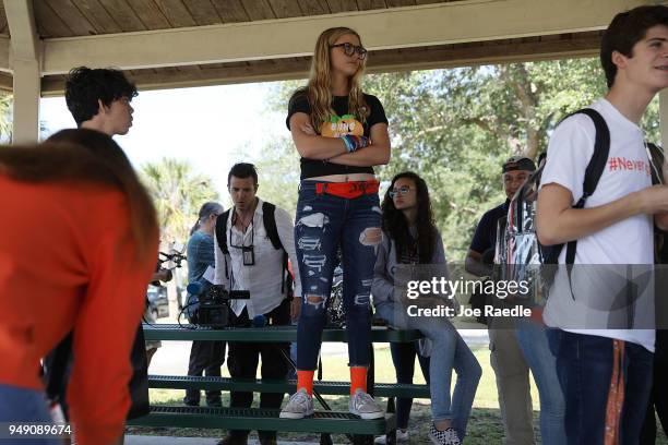 Delany Tarr ,a senior, gathers together with some of her fellow students from Marjory Stoneman Douglas High School, where 17 classmates and teachers...