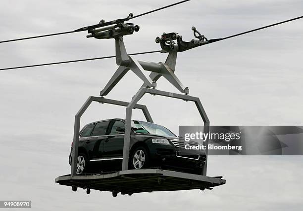 Volkswagen Touareg SUV travels by lift from an assembly line to the test grounds at the Volkswagen plant in Bratislava, Slovakia, Wednesday, June 16...