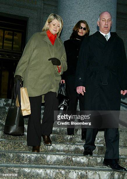 Martha Stewart exits the federal courthouse in New York, February 2, 2004 with her daughter Alexis, center.