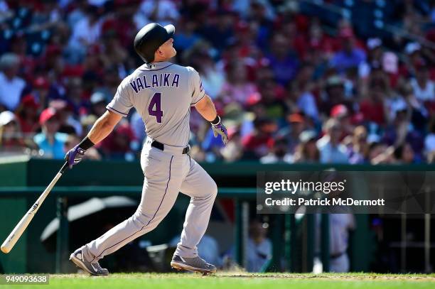 Pat Valaika of the Colorado Rockies bats against the Washington Nationals in the eighth inning at Nationals Park on April 14, 2018 in Washington, DC.