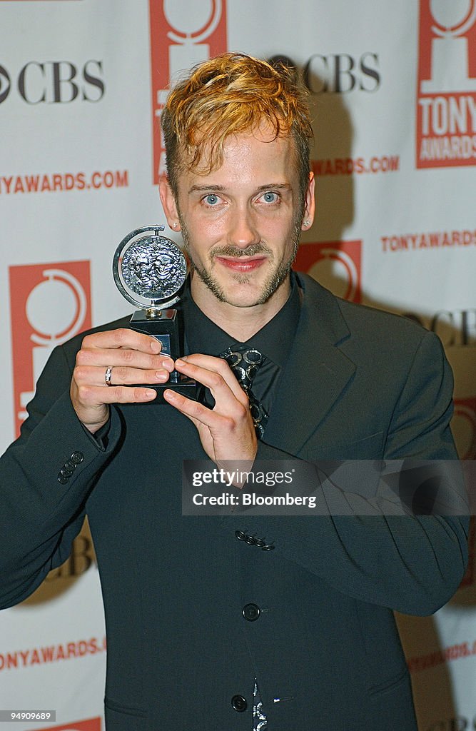 Jeff Whitty poses with his Tony award for Best Book of a Mus