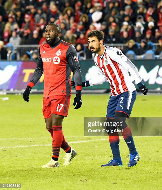 Jozy Altidore of Toronto FC watches the play against Oswaldo Alanís of Chivas Guadalajara during the CONCACAF Champions League Final Leg 1 on April...