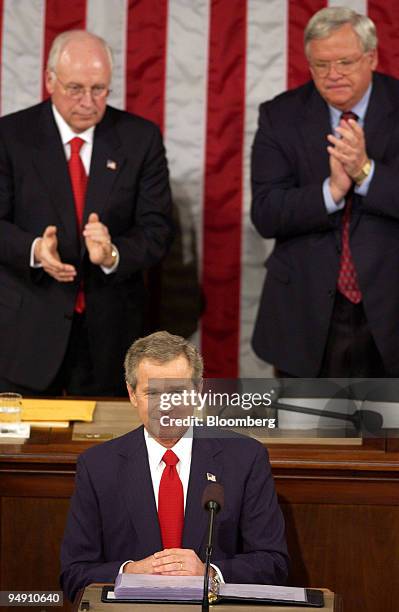 President George W. Bush delivers the State of the Union speech to Congress in Washington, DC, Tuesday, January 20, 2004. Behind him, from left: U.S....