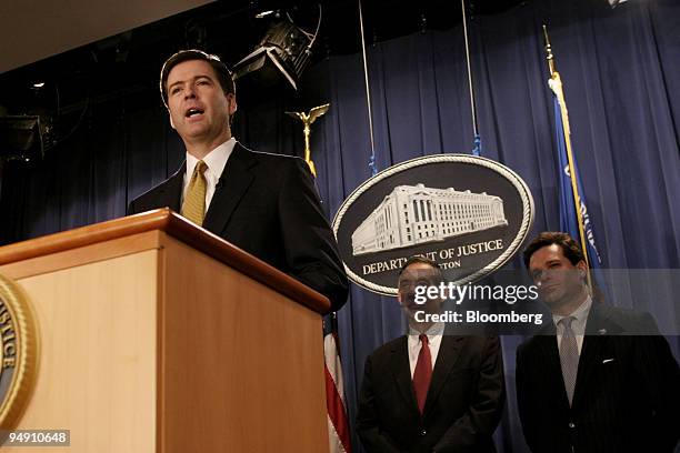 Deputy Attorney General James Comey discusses the Enron Corp. Case during a press conference at the Department of Justice in Washington, DC,...