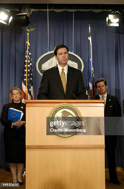 Deputy Attorney General James Comey discusses the Enron Corp. Case during a press conference at the Department of Justice in Washington, DC,...