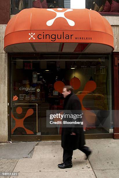 Pedestrian walks past a Cingular Wireless store in New York on January 14, 2004. SBC Communications Inc. And BellSouth Corp. May create the biggest...