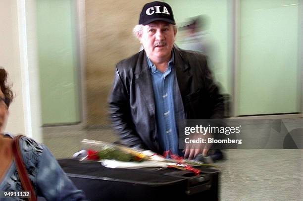 Alfeu Sterki, 65 from Washington DC, arrives Rio de Janeiro's International Airport in Brazil, after being given a rose as a welcome by the state...