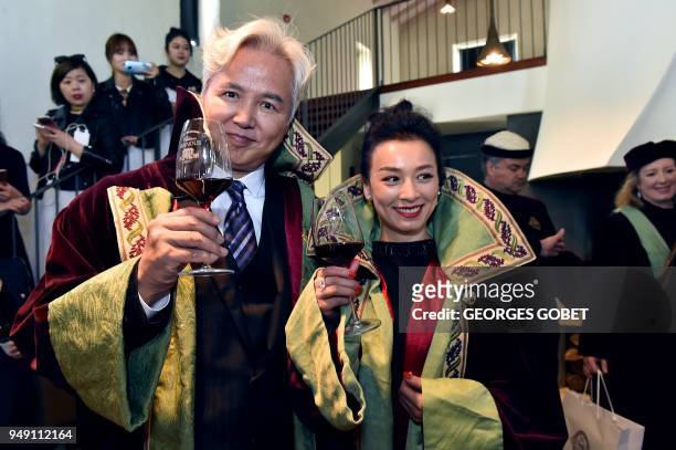 Chinese former actor and CEO of Shanghai Dowell Trading Rui-Yang Lin and his wife Chinese former actress and Shanghai Dowell Trading administrative...
