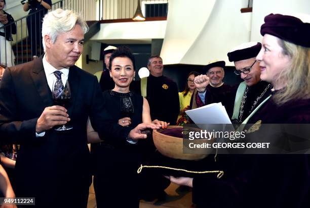 Chinese former actor and CEO of Shanghai Dowell Trading Rui-Yang Lin and his wife Chinese former actress and Shanghai Dowell Trading administrative...