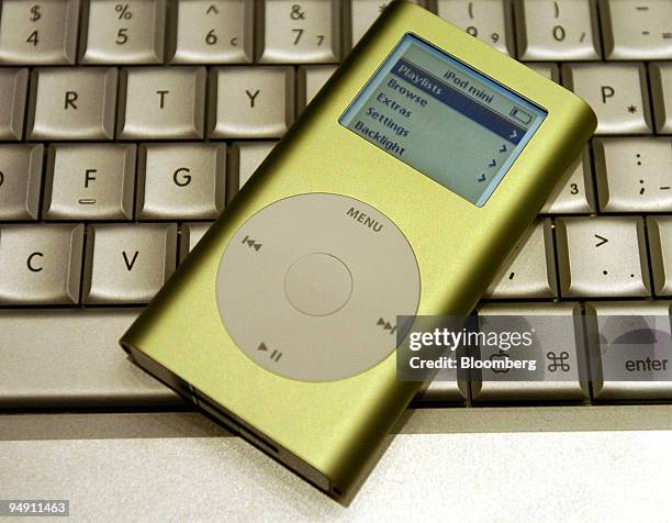 The new Apple Computer iPod mini is displayed during the Macworld Expo trade show Tuesday, January 6 in San Francisco, California. Shares of Apple...