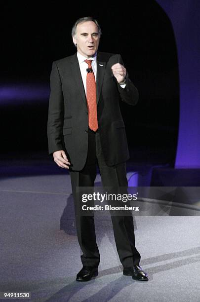 Ulrich Bez, CEO of Aston Martin Lagonda, introduces the Aston Martin DB9 Volante during the North American International Auto Show at Cobo Arena in...