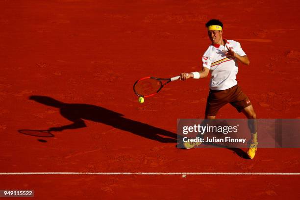 Kei Nishikori of Japan in action against Marin Cilic of Croatia during day six of the ATP Masters Series Monte Carlo Rolex Masters at Monte-Carlo...