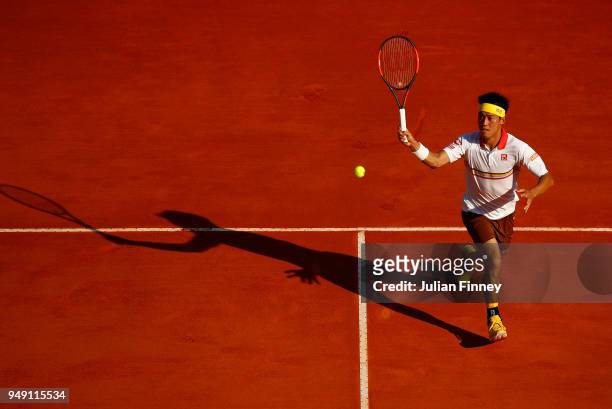 Kei Nishikori of Japan in action against Marin Cilic of Croatia during day six of the ATP Masters Series Monte Carlo Rolex Masters at Monte-Carlo...