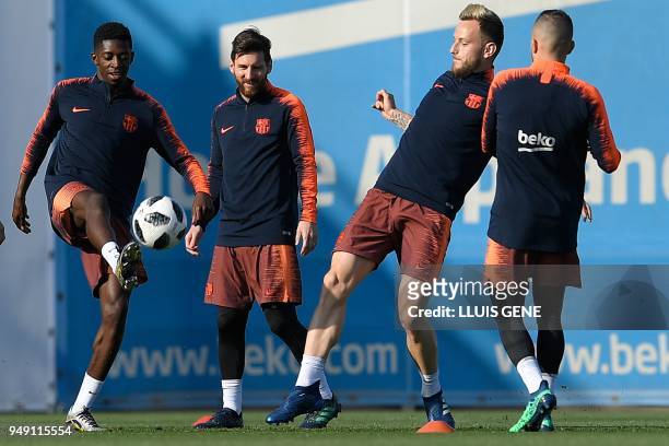 Barcelona's French forward Ousmane Dembele, Barcelona's Argentinian forward Lionel Messi, Barcelona's Croatian midfielder Ivan Rakitic and...