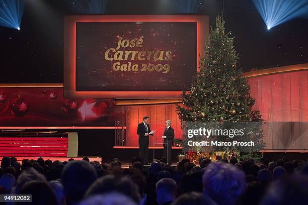 Presenter Axel Bulthaupt and Jose Carreras host the Jose Carreras Gala Show at the Neue Messe on December 17, 2009 in Leipzig, Germany.