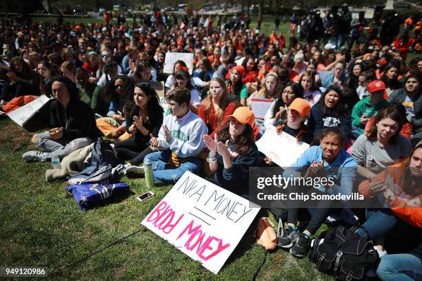 Several hundred high school students rally against the National Rifle Association and to call for stricter gun laws on the West Lawn of the U.S....